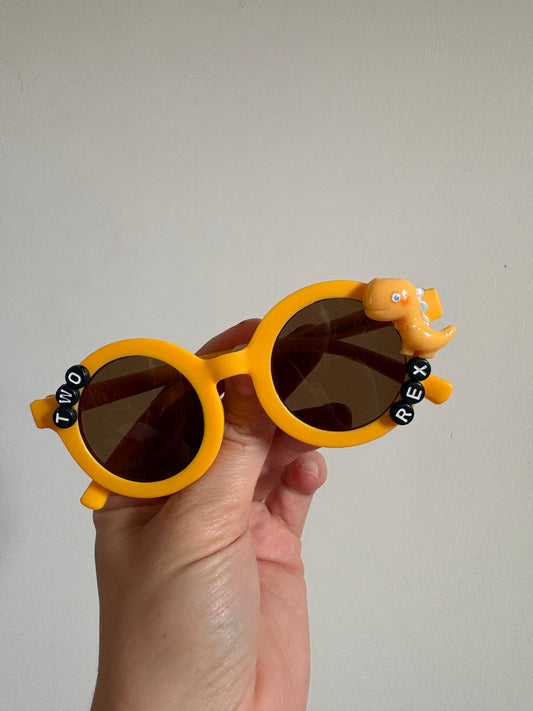 ‘Two Rex’ birthday celebration sunglasses.